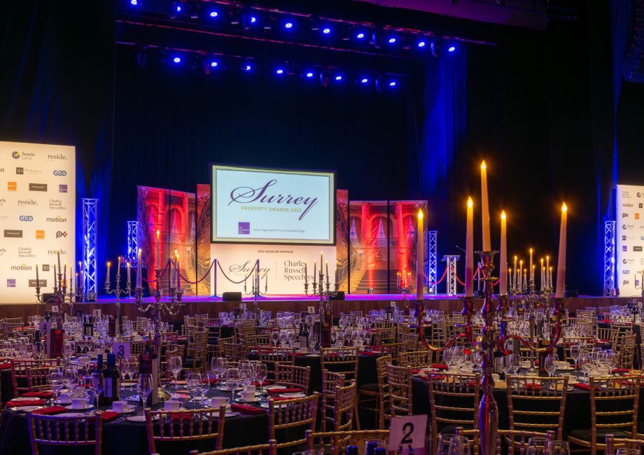 a picture of all the main room and stage at the event Surrey Property Awards 2023