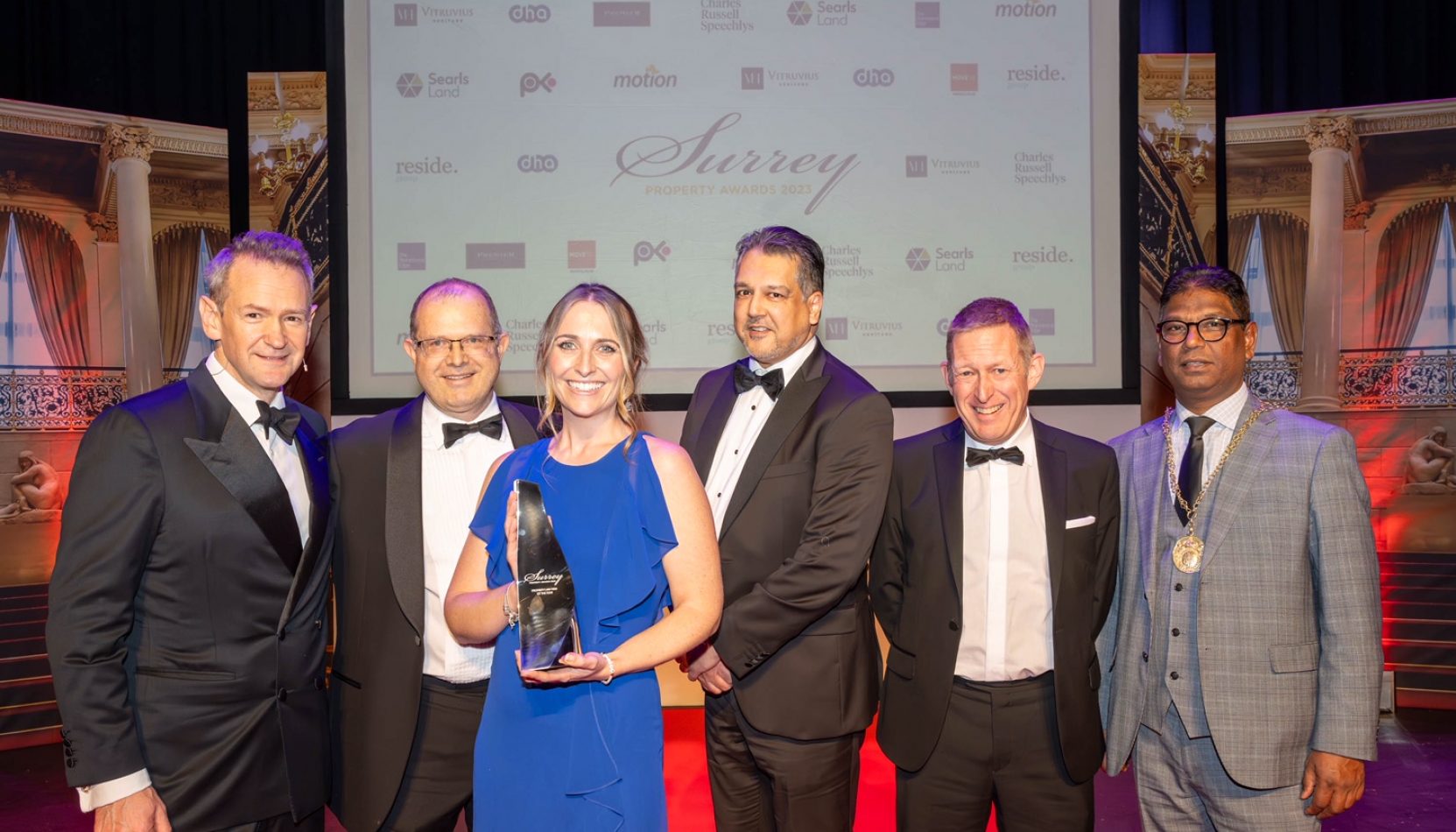 A picture of the Hart Brown Property Law Firm Team accepting their award at The Surrey Property Awards 2023